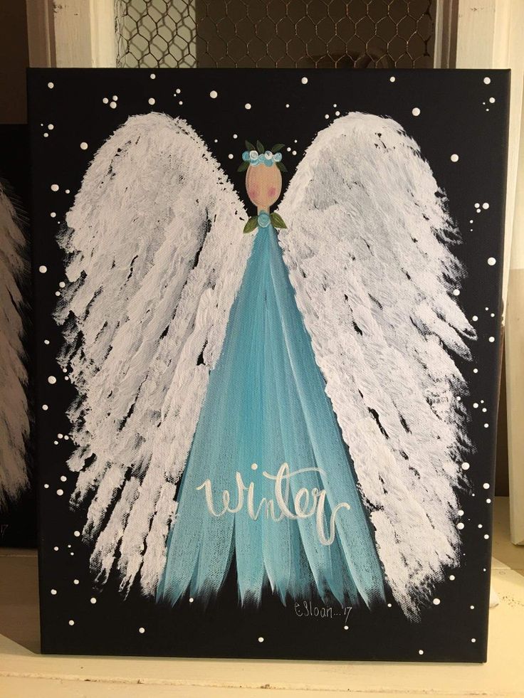 an angel painted on a canvas with white feathers