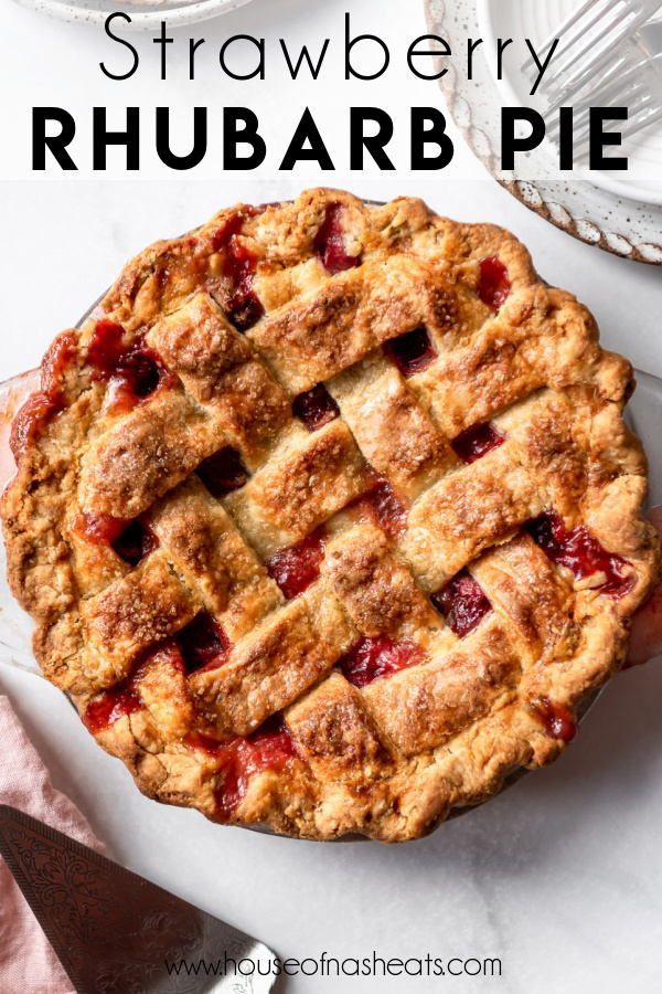 a strawberry rhubarb pie on a white plate with the text overlay