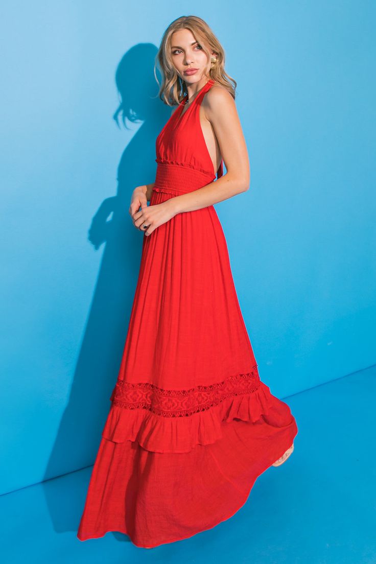 This ARRIVAL TIME WOVEN MAXI DRESS offers a beautiful, intricate pattern throughout with the addition of lace detailing along the neckline. It features intricate embroidery at the bodice to give a textured look and a ruffled hemline for a feminine finish. The smocked back waist band and back keyhole button closure ensure maximum comfort. Details Self: 65% Polyester, 35% Rayon Contrast: 100% Cotton Lining: 100% Polyester Size & Fit - Model is 5`8" And Wearing Size Small - Measurements Taken From Vacation Maxi Dress With Smocked Back, Fitted Floor-length Summer Maxi Dress, Fitted Floor-length Maxi Dress With Smocked Back, Beach Maxi Dress With Smocked Back, Red Smocked Back Maxi Dress For Summer, Beach Maxi Dress With Ruffles, Long Summer Dress With Smocked Back, Floor-length Maxi Dress With Smocked Back For Vacation, Red Maxi Dress With Smocked Back For Beach