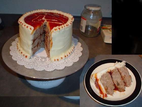 there is a cake that has been cut in half and on the plate next to it