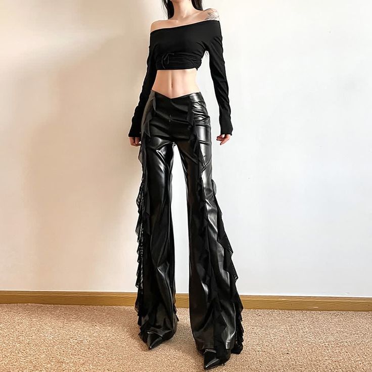 Elevate your wardrobe with our Black Leather Ruffle High Waist Flare Pants. Crafted from luxurious black PU leather, these statement pants feature a high waist and ruffle detailing for a bold, dramatic look. Perfect for those who embrace gothic, punk, rock, and club styles, these flare pants are a must-have for making an unforgettable fashion statement. Luxurious black PU leather High waist for a flattering fit Ruffle detailing for added drama Flare design for an edgy look Ideal for gothic, punk, rock, and club aesthetics Long Summer Pants, Fit Club, Bodycon Dresses Casual, Lace Decor, Long Trousers, Summer Black, Club Party, Slim Fit Trousers, Crop Top Blouse