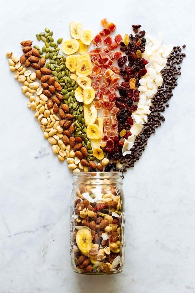 a jar filled with nuts and dried fruits