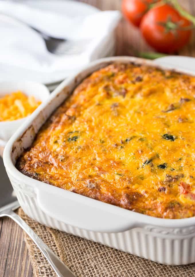 sausage and butternut squash breakfast casserole in a white dish on a table