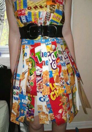 a woman wearing a dress made out of candy bars