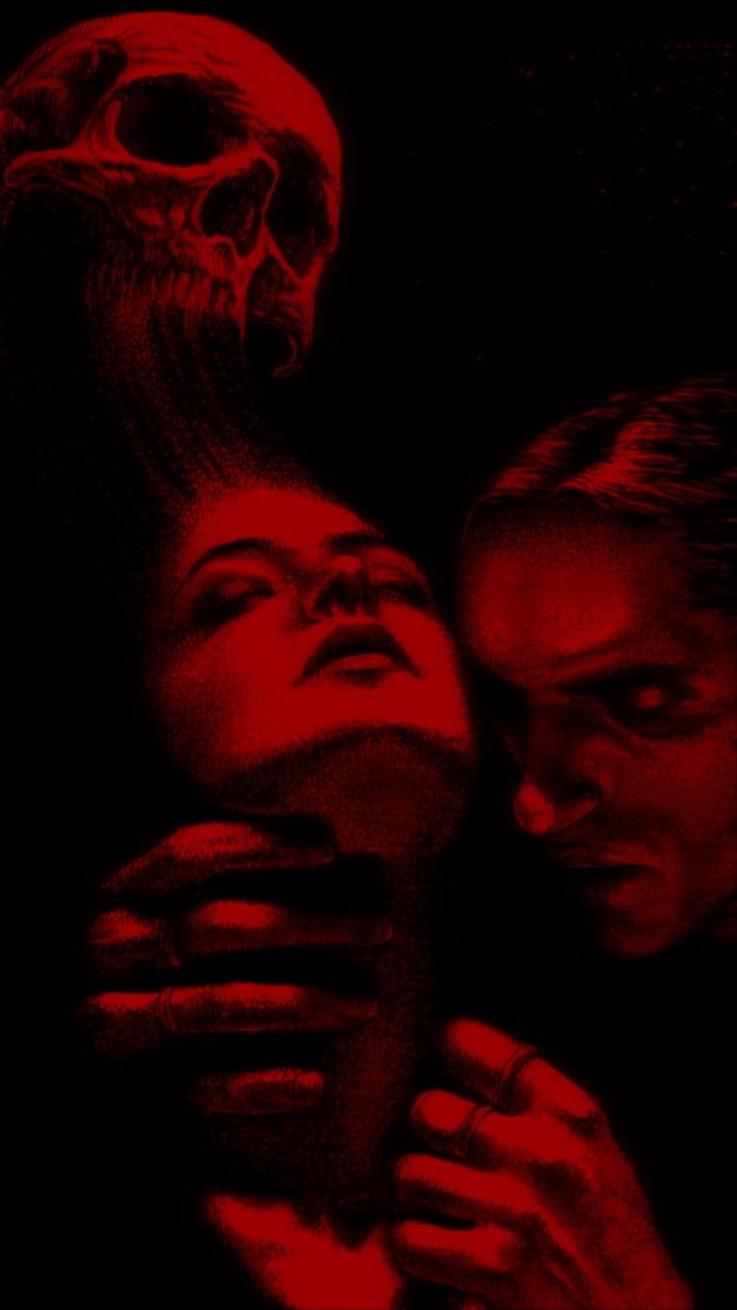 two women are looking at a skull on the back of her head, with red light coming from behind them