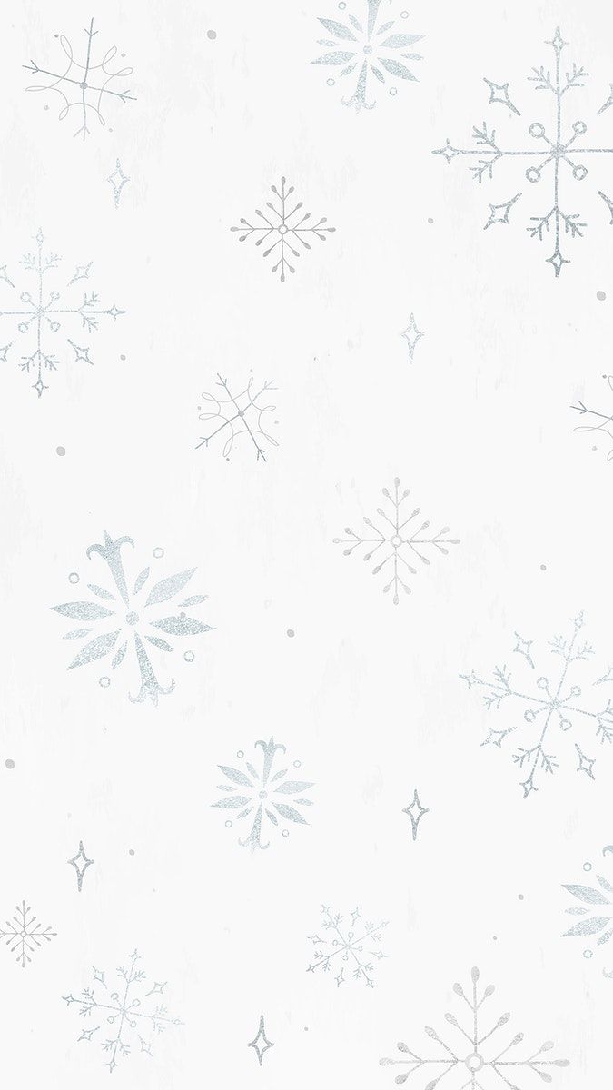 snowflakes on a white background that looks like they are falling