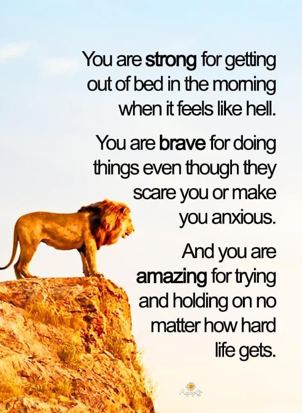 a lion standing on top of a rock next to a quote from the book, you are strong for getting out of bed in the morning when it feels like hell