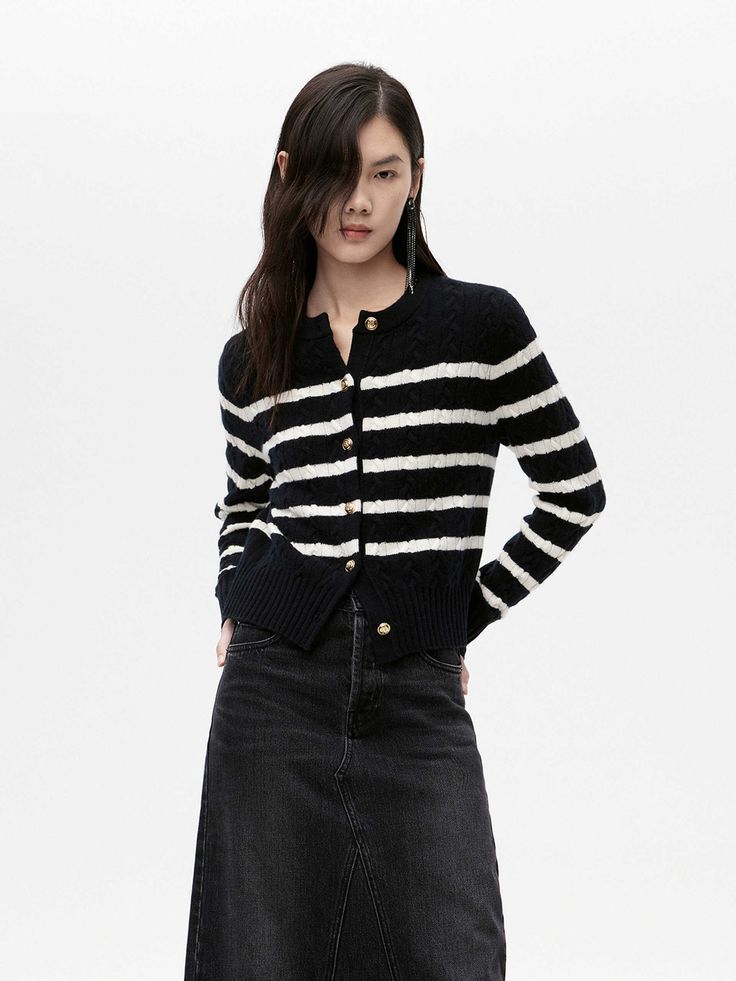 MO&Co. Women's Cable Texture Striped Cardigan Introducing the cardigan, a luxurious blend of warm wool and cashmere fabrics. This timeless staple features a black and white striped pattern and the fitted silhouette further celebrates the sophistication of this stylish piece. Features : - Warmth and comfort wool and cashmere fabric- Classic black and white striped- Cropped and slim fit Code: MBC4CART07The back length of size S is 50.5cmMATERIALS & CARE Material: 70% Wool 30% CashmereWrap metal pa Striped Cardigan For Fall, Fitted Striped Cardigan For Winter, Striped Fitted Cardigan For Winter, Luxury Striped Cardigan For Workwear, Elegant Striped Winter Sweater, Winter Striped Cardigan, Classic Striped Winter Cardigan, Striped Cotton Long Sleeve Cardigan, Luxury Striped Winter Cardigan