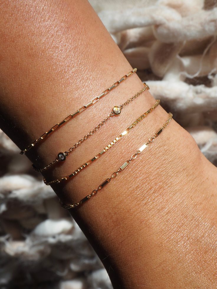 Designed with mixed square and rectangular links, the Dayna Bracelet will add a unique texture to your stack. Designed as part of our BBT Luxe collection, you'll never have to take this bracelet off, as we pride ourselves on fine jewelry without any of the markups. 14k Solid Gold Length: 6" + 1" Extender Width: 2 mm Pieces from this collection are not eligible for any discounts or promotions Fine Jewelry Everyday Jubilee Bracelet, Everyday Fine Jewelry Jubilee Chain Bracelet, Dainty Adjustable Bracelet For Everyday, Fine Jewelry Jubilee Bracelet For Everyday, Everyday Fine Jewelry Jubilee Bracelet, Dainty Everyday Stackable Bracelets, Stackable Yellow Gold Bracelet For Everyday Wear, Yellow Gold Stackable Bracelets For Everyday, Dainty Stackable Bracelets For Everyday