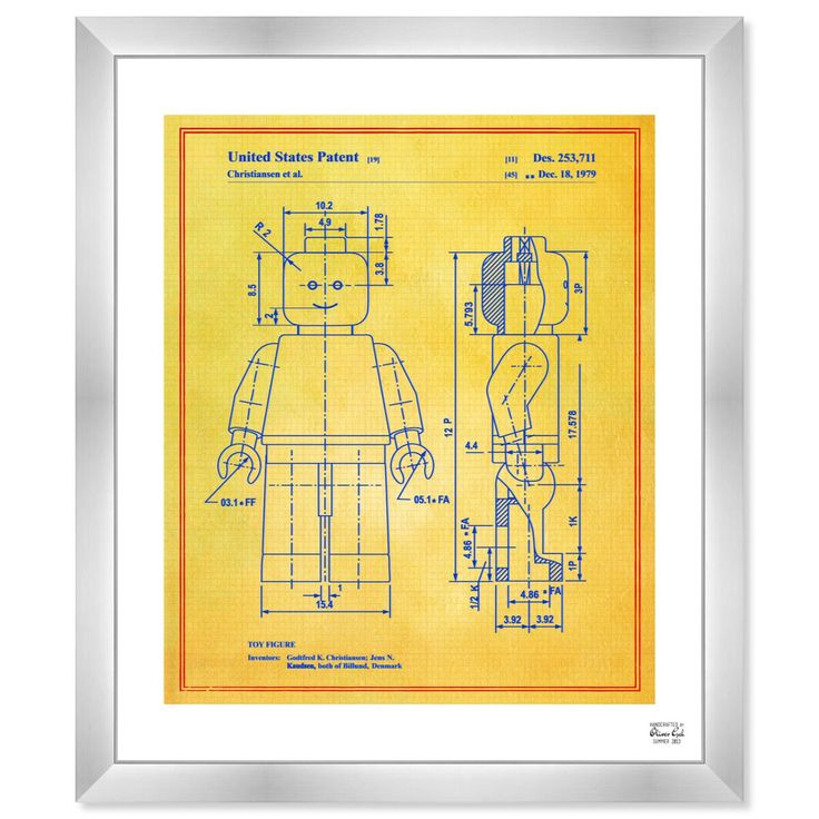 a framed blueprint drawing of a lego figure