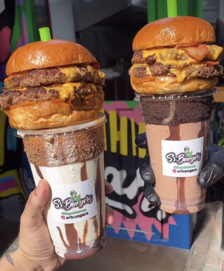 two burgers with ice cream and chocolate milkshakes