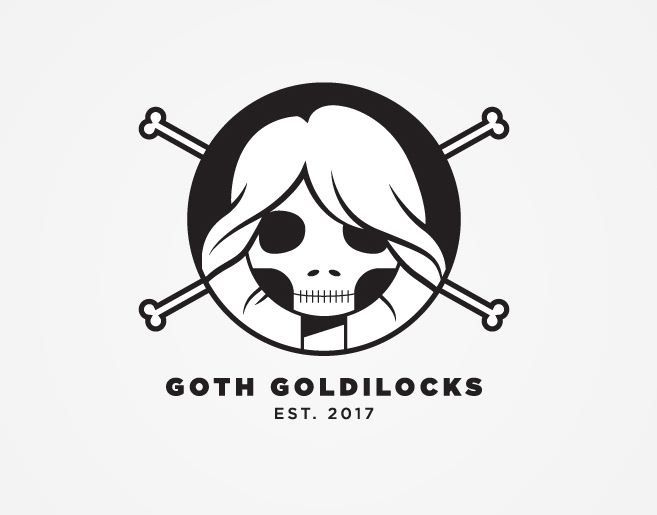 the logo for goth goldilocks est 2017, featuring a skull and crossbones