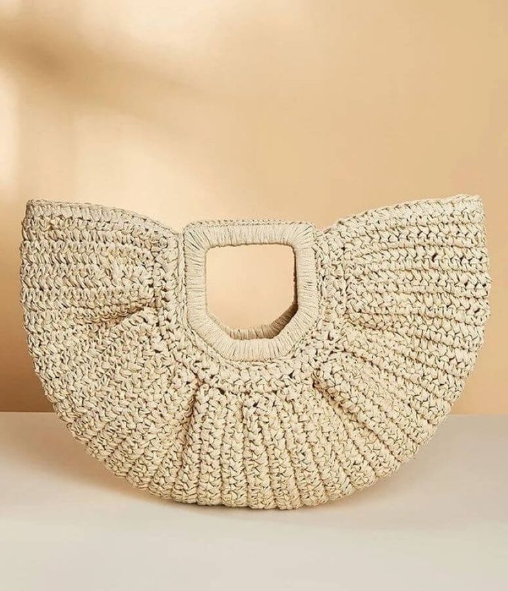 A must-have handbag for those sunny days and beyond. Crafted with natural raffia material, this curved handbag exudes a charming and stylish appeal that's sure to elevate your summer look. Chic and On-Trend: Our Half-Moon Straw Bag features a curved design that adds a touch of modernity and elegance to your outfit. Stay on-trend with this fashionable and eye-catching handbag that complements your style flawlessly. Eco-Friendly Raffia Material: Embrace the beauty of nature with this handbag, as i Stella Bag, Beach Basket, Braided Bag, Straw Handbags, Handbag For Women, Straw Bags, Bag Trends, Big Bags, Simple Bags