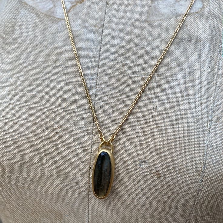 OVAL LABRADORITE PENDANT SET IN 22K GOLD ON 18K CHAIN, 3.36 CARAT • DESIGNED AND HAND FORGED IN NEW YORK • LENGTH: 18.5 INCHES Please email info@elihalili.com or call the studio at 212-941-7979 for any inquiries. Formal Gold Chain Necklace With Gemstone, Gold Teardrop Pendant Necklace With Gemstone, Gold Necklace With Teardrop Gemstone Pendant, Artisan Gold Custom Necklace Pendant, Artisan Gold Pendant Custom Necklace, Artisan Gold Custom Pendant Necklace, Luxury Handmade Oval Pendant Necklaces, One Of A Kind Yellow Gold Necklaces, Artisan Oval Gold Jewelry