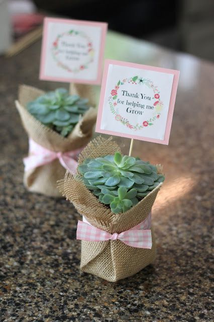 small succulents wrapped in burlock with thank you for being my groom