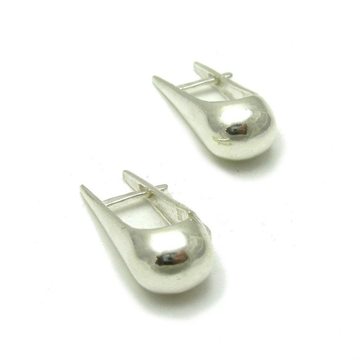 Sterling silver earrings. Stamped 925. Approximate weight 6.7 grams. Dimensions 2.5x0.9cm (1.00x0.36 inches). All our jewels are made from solid sterling silver 925/1000 and are carefully crafted by hand in our family workshop. We dispatch your orders in 5 working days, worldwide and the postage is $5. We ship registered priority mail. Please allow 5-7 working days for delivery in Europe and 10-15 working days outside Europe. For any questions - please do not hesitate to contact me! Classic Silver Pierced Huggie Earrings, Classic Silver Huggie Pierced Earrings, Classic Sterling Silver Drop Clip-on Earrings, Modern Sterling Silver Clip-on Earrings For Formal Occasions, Classic Silver Pierced Plug Earrings, Classic Sterling Silver Earrings With Polished Finish, Classic Sterling Silver Pierced Earrings, Silver Huggie Earrings In Sterling Silver, Sterling Silver Teardrop Huggie Earrings For Formal Occasions