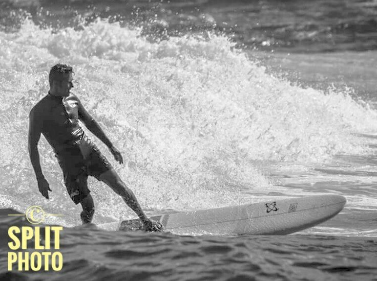 a man riding a surfboard on top of a wave in the ocean with words split photo