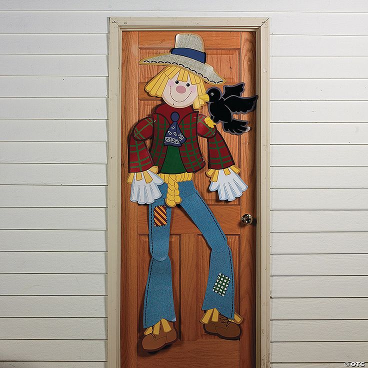 a door with a scarecrow painted on it