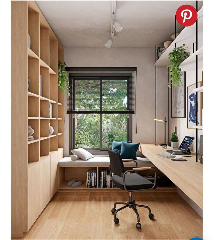 a room with a desk, chair and bookshelf in it that has plants on the shelves