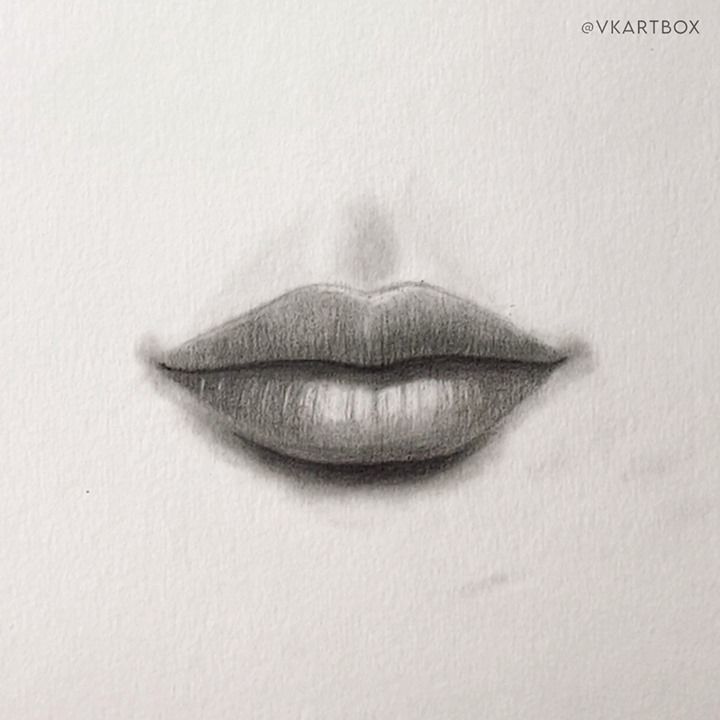 a pencil drawing of a woman's lips