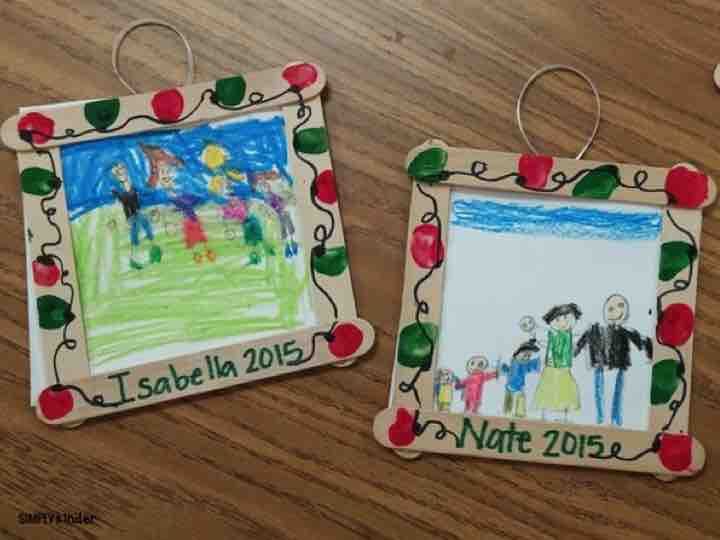 two christmas ornament with children's drawings on them, one is for natt