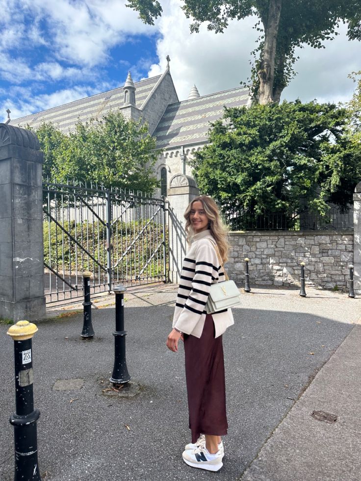 Brown Skirt Knit, Brown Midi Skirt Outfit Summer, New Balance Midi Skirt, Satin Brown Skirt, Knitted Maxi Skirt Outfit, Brown Satin Maxi Skirt Outfit, Long Skirt Outfits For Autumn, Satin Brown Skirt Outfit, Brown Silk Maxi Skirt Outfit