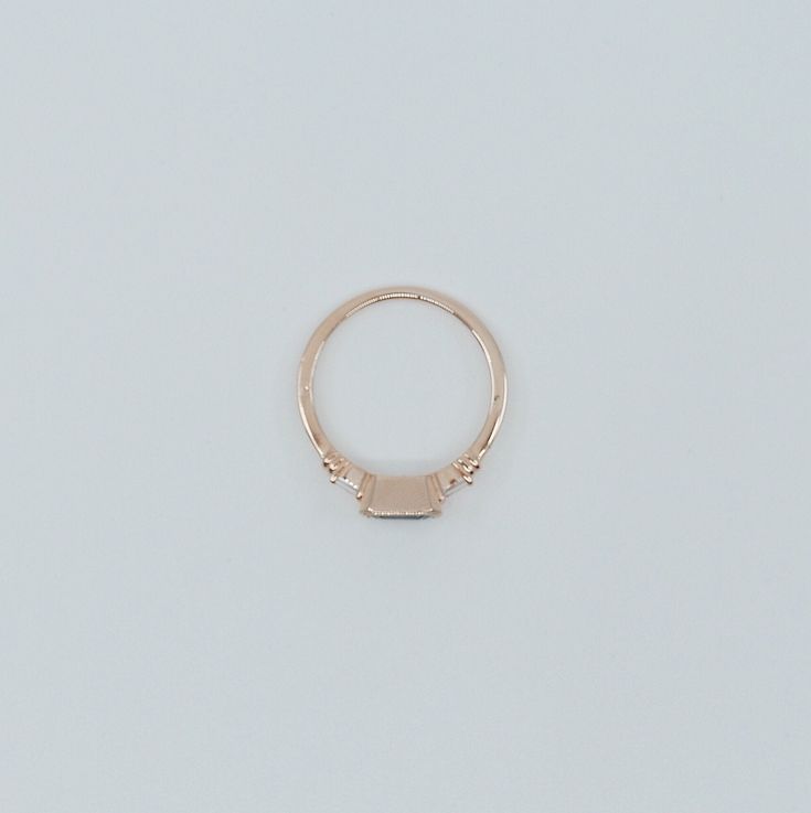 The Maggey ring is like an old soul, a classic beauty with hints of the modern woman. This up-to-date vintage inspired ring can be worn as an alternative engagement ring, or as an everyday ring. Details: 14k gold (available in rose, white or yellow gold)Emerald cut Blue Sapphire is 5.5mm x 4mm Tapered diamond baguettes about 2.5x1.4mm Also available in Green and Pink Tourmaline (please see other listings) Free Shipping on Domestic Orders Materials: Sapphire, diamond, 14k gold, blue sapphire Need Diamond And Sapphire Ring, White Gold Sapphire Ring, Diamond Ring Vintage, Vintage Inspired Rings, Gold Chain Choker, Diamond Baguette, Dainty Choker, Alternative Engagement Ring, Diamond Stacking Rings