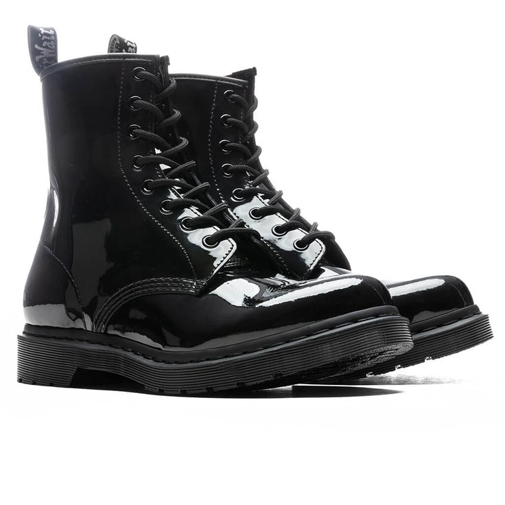 For over 60 years, Dr. Martens has continued to craft iconic boots that emphasize tactical and grunge aesthetics as seen in the 1460 Patent Lamper. Crafted from authentic Patent Lamper leather, this monochromatic design spotlights a heel loop and black welt stitching. The iconic AirWay cushioning system absorbs energy and suppresses shock at the feet. Natural leather and textile comprise the lining, while the PVC outsole ties together the premium aesthetic. Patent Lamper leather construction Hee Premium Aesthetic, Grunge Aesthetics, Monochromatic Design, Doc Martens, Over 60, Dr. Martens, Natural Leather, Shoe Collection, Patent Leather