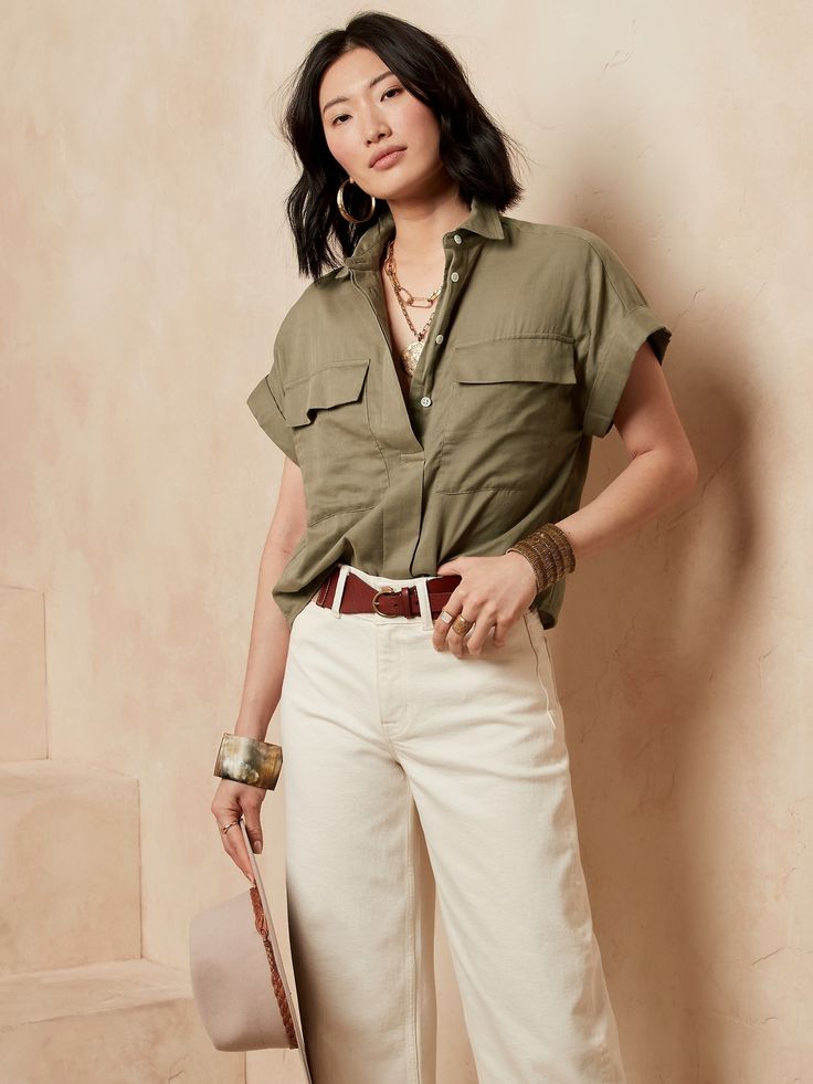 Elegant with utilitarian details, this breezy cotton gauze shirt is ideal for warmer adventures with pocket space and cuffed sleeves, little details that make a great difference when the journey calls for complete freedom.  BOXY FIT: Relaxed fit - no Casual Button-up Top With Cargo Pockets, Earthy Professional Outfits, Utility Style Summer Tops With Patch Pockets, Utility Tops With Patch Pockets For Summer, Relaxed Fit Button-up Tops With Cargo Pockets, Utility Style Collared Tops With Cargo Pockets, Relaxed Fit Collared Tops With Cargo Pockets, Khaki Utility Top With Flap Pockets, Summer Utility Tops With Pockets