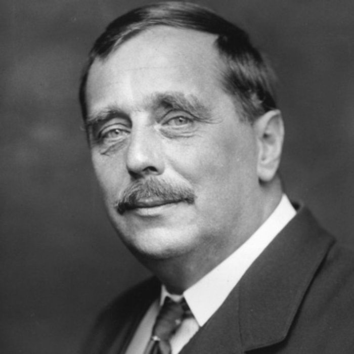 an old black and white photo of a man in a suit with a moustache