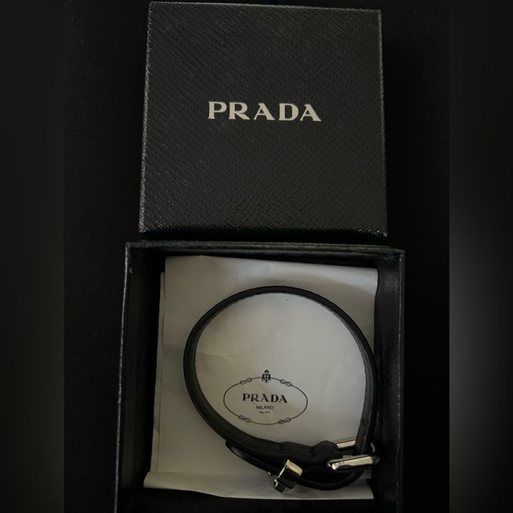 Authentic Brand New Prada Miu/Miu Bracelet. This Bracelet Has Never Been Worn. Questions? Leave A Comment Below! Happy Poshing Designer Leather Bracelet For Formal Occasions, Designer Black Bracelet As Gift, Designer Leather Bracelets, Designer Jewelry With Leather Strap As Gift, Designer Adjustable Leather Bracelet, Designer Black Leather Strap Bracelets, Designer Black Bracelets With Leather Strap, Modern Formal Bracelet With Logo Charm, Modern Formal Bracelets With Logo Charm