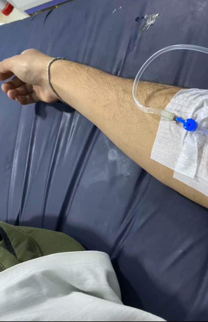 a person with an iv attached to their arm