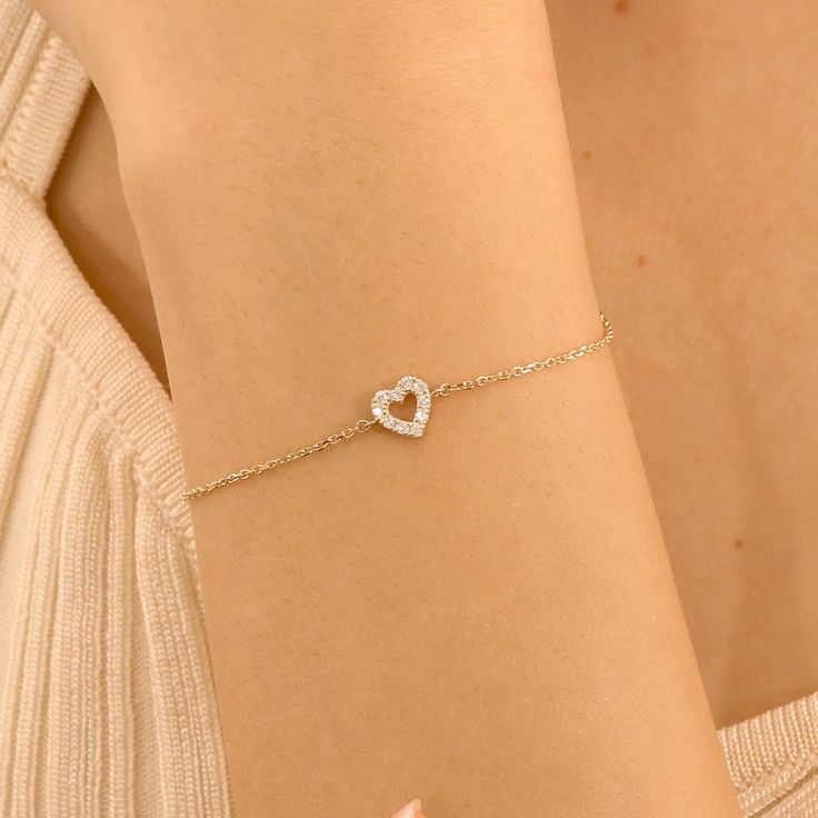 14k Gold Small Diamond Heart Bracelet, Cute Diamond Heart Bracelet, Dainty Diamond Bracelet, Birthday Gift, Minimalist Bracelet, Lily Handmade Natural Diamonds Solid Gold Total Carat Weight Diamond: 0.10ctw Dimensions of Heart: 6.75 mm Please note. The adjustable option is available upon request. Please see the Personalization box under the drop-down menu. Orders with free shipping go out with USPS First Class Mail tracking. We require a signature for orders more than $500. If you need a signatu Valentine's Day Yellow Gold Heart Bracelet With Cubic Zirconia, White Gold Heart Charm Bracelet For Anniversary, White Gold Heart Bracelet With Charm For Anniversary, Heart-shaped Yellow Gold Bracelets With Cubic Zirconia, Yellow Gold Heart-shaped Cubic Zirconia Bracelets, Heart-shaped Yellow Gold Cubic Zirconia Bracelets, White Gold Heart Diamond Bracelet For Valentine's Day, Heart-shaped White Gold Diamond Bracelet For Valentine's Day, Yellow Gold Heart Bracelet In Cubic Zirconia