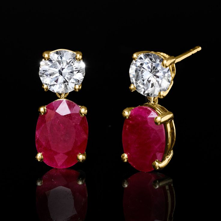 Ross-Simons - 3.20ct t. w. Ruby, 1.00ct t. w. Lab Grown Diamond Drop Earrings in 14kt Yellow Gold. An RS exclusive. Treat yourself to a unique blend of lab-grown diamonds and mined precious gemstones at an incredible value. These dazzling drop earrings feature fiery 3.20 ct. t. w. oval rubies topped with icy sparkle from 1.00 ct. t. w. round brilliant-cut lab-grown diamond tops. Finely crafted in polished 14kt yellow gold. Lab-grown diamonds are identical to mined diamonds according to their opt Classic Red Diamond Earrings With Brilliant Cut, Classic Ruby Diamond Earrings With Accents, Classic Ruby Diamond Earrings With Diamond Accents, Classic Oval Diamond Earrings Aaa Quality, Ruby Top, Physical And Chemical Properties, Diamond Tops, Pure Design, Earrings In Gold