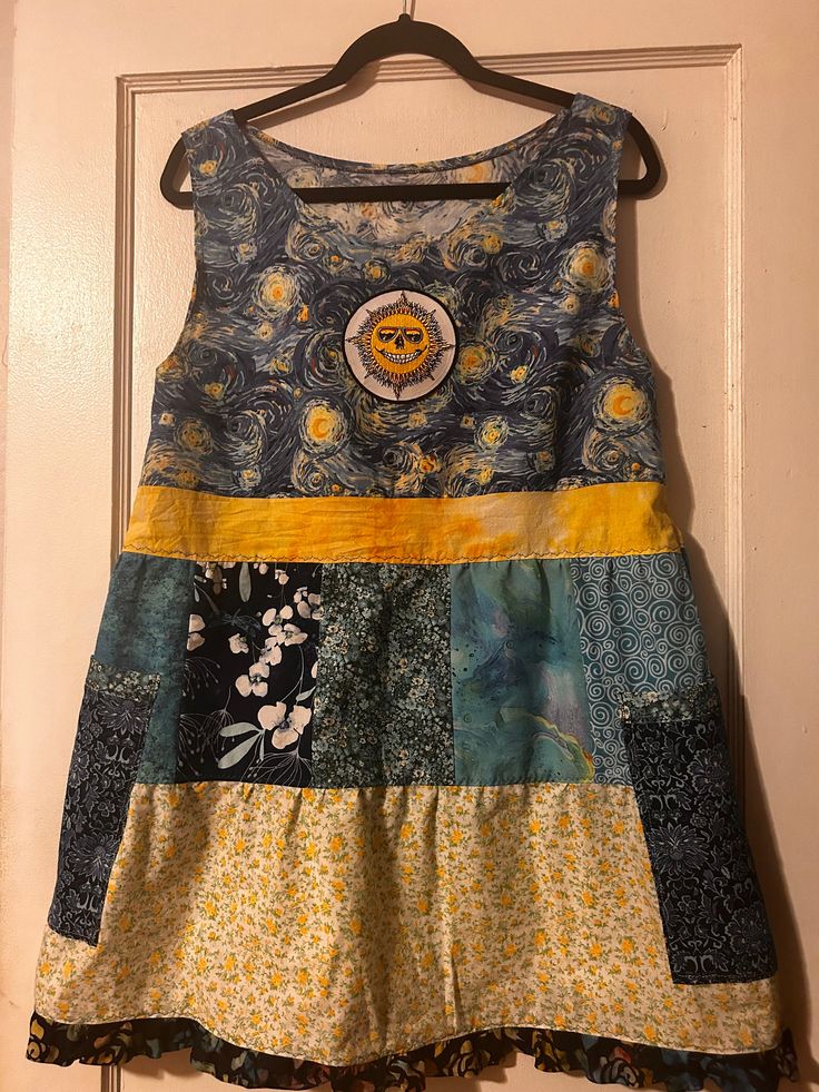 This is a one-of-kind handmade short patchwork dress. The fabric is 100% cotton, prewashed; blues and yellows. Jasper Sun patch and 2 side pockets. Fits women's M Patchwork Dress, Sun Dress, Dress Clothes For Women, Sundress, Dress Outfits, Sun, Womens Dresses, Yellow, Clothes For Women