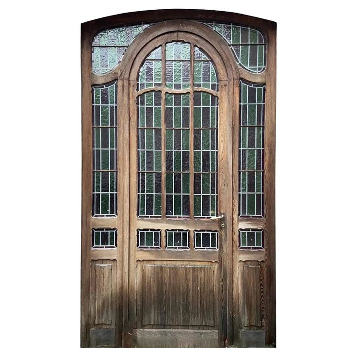 Entrance door and its stained glass surround For Sale at 1stDibs | front door with glass surround, exterior doors for sale, stained glass door Stained Glass Door Arch, Craftsman Doors With Leaded Glass Exterior Front Entry, Wooden Main Door Design Entrance Modern, Glass Entry Doors, Stained Glass Front Door, Stained Glass Wood, Historic Doors, Arched Front Door, Victorian Front Doors