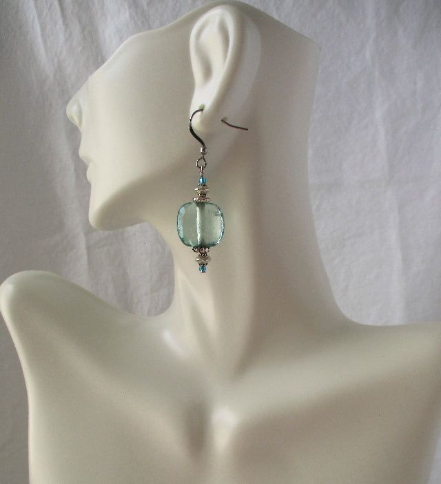 These light green square earrings will add a cool finish to your favorite summer outfit! 2" in length, made with glass beads and steel earhooks (no nickel/no lead). These light green square earrings ship to you in a gift box, ready to give as a present or to keep and store. Back To Beaded Earrings Nickel-free Blue Beaded Earrings For Gifts, Nickel-free Blue Beaded Earrings As Gift, Czech Glass Earrings With French Hook For Gift, Blue French Hook Jewelry As Gift, Blue Metal Beaded Earrings For Gift, Turquoise Glass Earrings For Gift, Glass Beaded Dangle Earrings For Gift, Blue Hypoallergenic Beaded Earrings As Gift, Hypoallergenic Blue Beaded Earrings For Gift