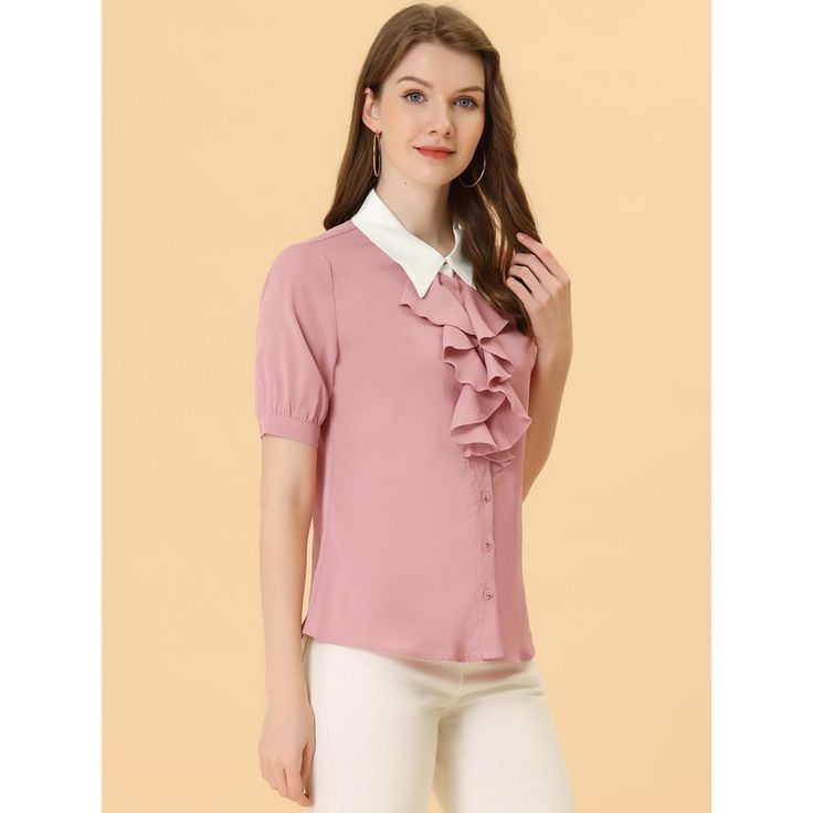 A lightweight polyester shirt with a partially ruffled front closure adds sleek interest to the look. These charming Victorian short-sleeved tee-shirt sleeves ruffle front tops bring you a comfortable feeling. The ruffle detail design, makes you look slimming fit. A casual elegant style shirt perfectly pairs with jeans or skirts for an office look for work. Solid Color Ruffled Workwear Shirt, Solid Color Ruffled Shirt For Work, Solid Color Ruffle Shirt For Work, Feminine Ruffled Office Shirt, Feminine Office Shirt With Ruffled Collar, Solid Collared Shirt With Ruffles, Collared Solid Shirt With Ruffles, Collared Ruffle Shirt, Trendy Ruffled Collar Top