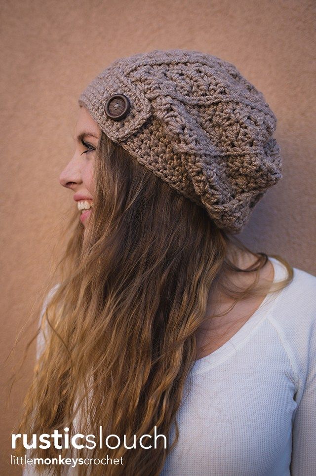 a woman with long hair wearing a knitted hat