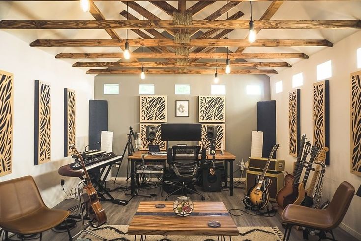 a living room filled with furniture and musical instruments