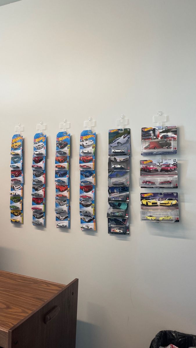 there is a wall with some cars on it