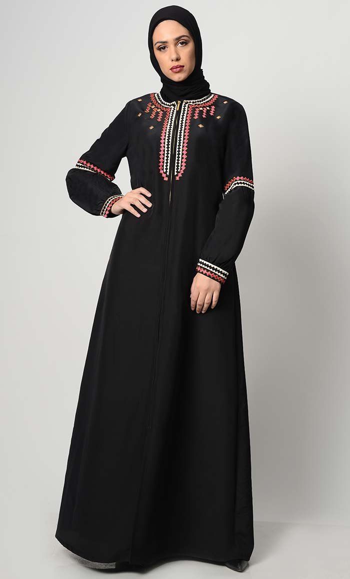 Geometric Embroidered Abaya-Black Black Long Sleeve Abaya For Fall, Black Long Sleeve Kaftan For Eid, Elegant Long Sleeve Kaftan With Floral Embroidery, Elegant Long Sleeve Floral Embroidered Kaftan, Elegant Long Sleeve Thobe With Floral Embroidery, Traditional Long Sleeve Abaya For Spring, Fitted Black Abaya For Eid, Black Long Abaya, Spring Workwear Abaya