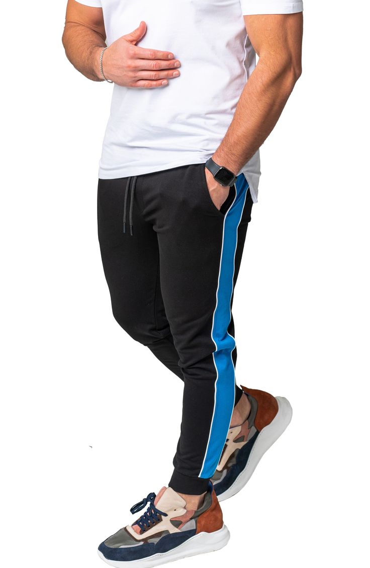 Athleisure is reinvented in these comfy joggers that leave others in the dust with supersoft fleece, bold side stripes and a skinny fit. Elastic/drawstring waist Front scoop pockets 92% cotton, 8% elastane Hand wash, dry flat Made in Turkey Adidas Relaxed Fit Athleisure Joggers, Relaxed Fit Three Stripes Sweatpants For Jogging, Sporty Streetwear Joggers With Contrast Stripes, Sporty Sweatpants With Contrast Stripes For Streetwear, Sporty Blue Sweatpants With Three Stripes Branding, Sporty Blue Joggers With Three Stripes Branding, Blue Sporty Sweatpants With Three Stripes Branding, Casual Cotton Joggers With Contrast Stripes, Sportswear Sweatpants With Contrast Stripes For Streetwear