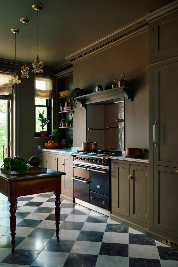 an image of a kitchen setting with black and white checkered flooring on the floor