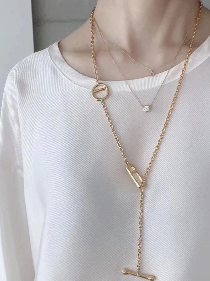 Elevate your accessory game with our 925 Sterling Silver Long Sweater Necklace. Made from genuine sterling silver, this timeless and minimalist necklace adds a touch of sophistication and elegance to any outfit. Perfect for any occasion, whether casual or formal, and a must-have addition to your jewelry collection. Shop now and embrace the allure of sterling silver. Metal: 18K Recycled Gold Plated Vermeil on Recycled Sterling Silver/Recycled Sterling Silver Chain Length:800mm Sliver Earrings, Sweater Necklace, Long Sweater, Tiger Eye Stone, Enamel Earrings, Recycled Gold, Metal Earrings, Minimalist Necklace, Recycled Sterling Silver