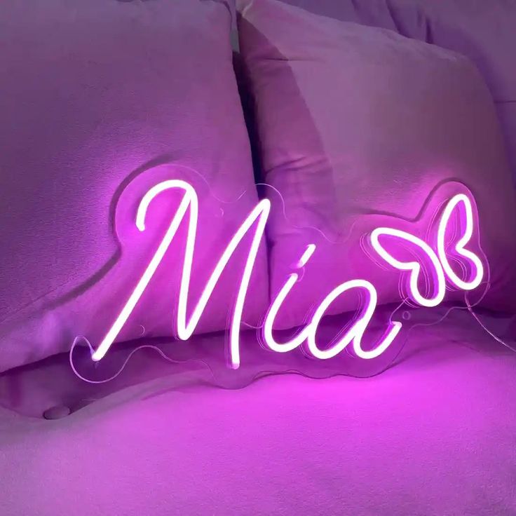 mia-name-neon-sign illuminates a space with a playful pink script, adding a touch of whimsy - from manhattonneons.com. Neon Sign Design Ideas, Mia Name Design, Led Words Lights Neon Signs, Led Name Sign, Hazardous Materials, Business Signage, Neon Sign Bedroom, Custom Wedding Signs, Baby Name Signs