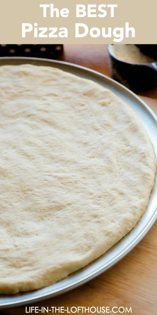 an uncooked pizza dough on a pan with the words, how to make the best pizza dough