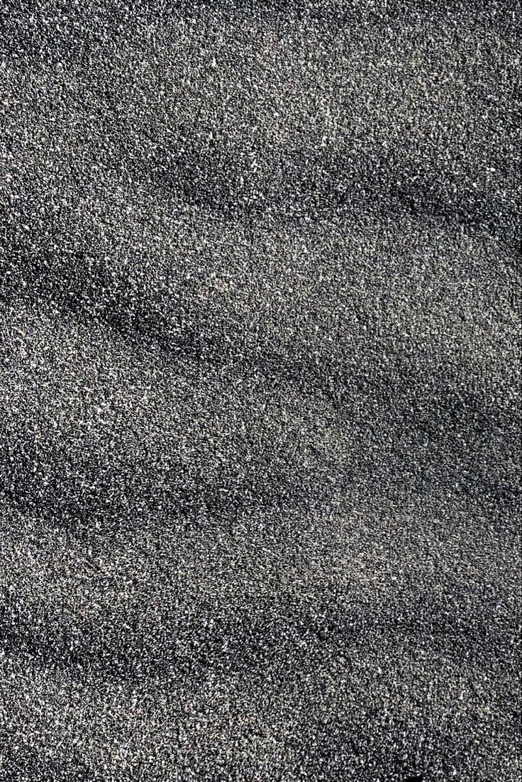 an abstract black and white photo of sand