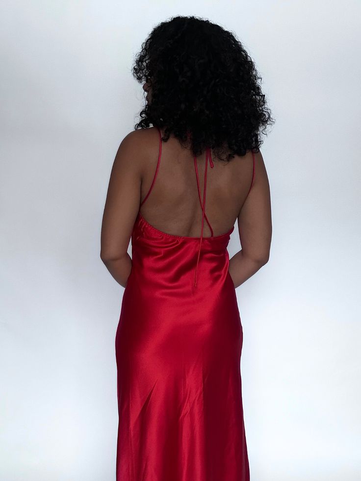 Indulge in luxury with our Razzle Red Midi Satin Dress. Crafted with a thick, silky material, this stunning dress exudes elegance and sophistication. The vibrant red color and midi length make it a timeless addition to your wardrobe. Elevate your style and make a statement with this exclusive piece. Fabric Details: 96% Polyester 4% Spandex Model is wearing a size SMALL, this style fits true to size. Midi Satin Dress, Red Midi, Satin Dress, Fabric Details, Stunning Dresses, Vibrant Red, Satin Dresses, Midi Length, Red Color