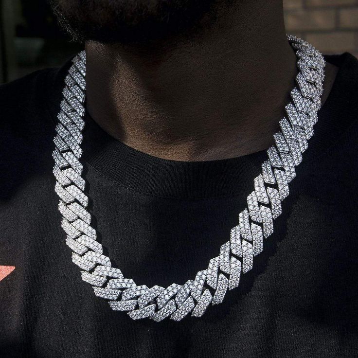 Custom-designed and molded, the 19mm Diamond Prong Link Choker is iced out in hand-set stones that will stand out from the pack. This exclusive piece is sure to upgrade any fit; it's the perfect drip. Boss up and flex with the GLD gang! This product is guaranteed for life - GLD will repair the item should you experience any defects in craftsmanship or breakage. Chain Specifications - Length: 16", 18", 20" & 22" - Width: 19mm - Weight: (Weight can vary +/- 5 grams) 14k White Gold Plated: - 18 Iced Out White Chain Link Jewelry, Luxury Iced Out Link Chain Necklace, Cuban Link Diamond Necklace For Streetwear, Iced-out White Gold Cuban Link Necklace, Iced Out Chain Link Jewelry For Streetwear, Diamond Cuban Link Chain, Forever Products, Expensive Jewelry Luxury, Corporate Outfits